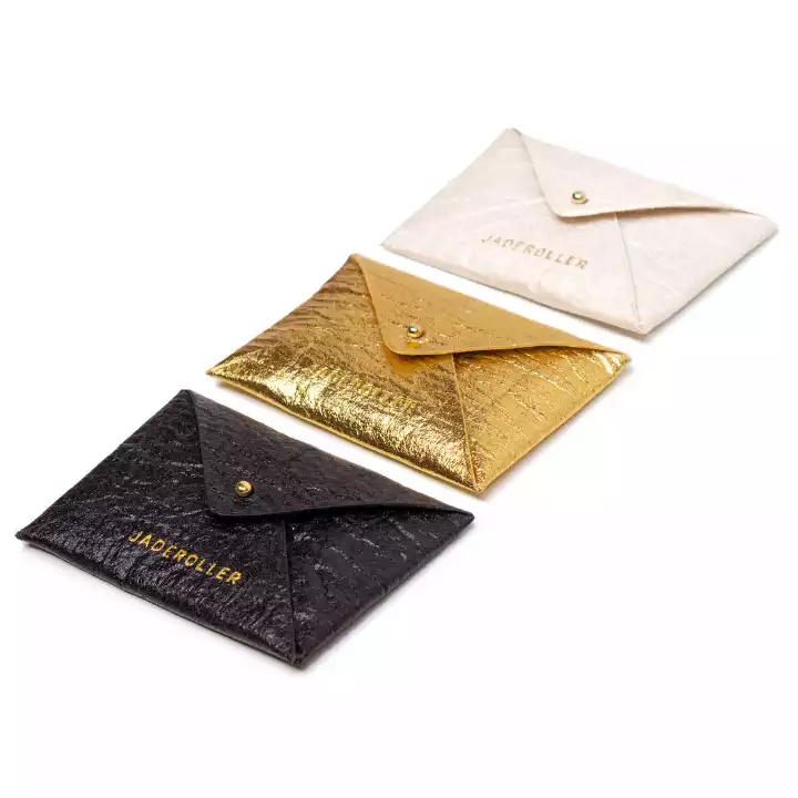 L'Étui Gua Sha de Jade Roller en trois couleurs